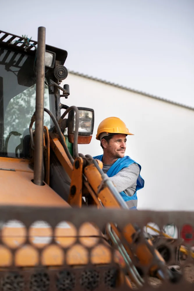 Man using an excavator for digging on day light
